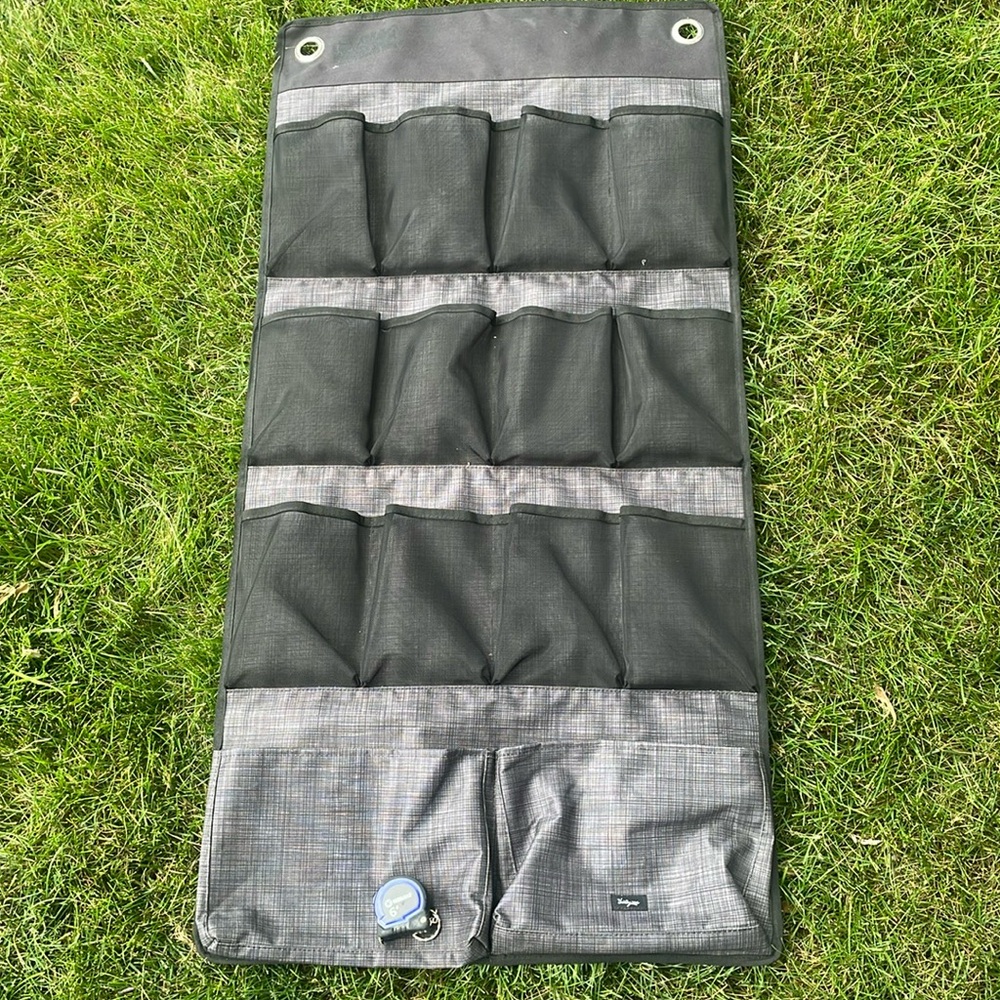 Thirty-one door compartment hanger